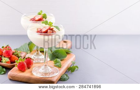 Delicous And Nutritious Double Color (colour) Strawberry Desserts With Mint And Diced Sarcocarp Topp