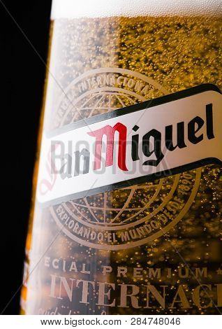 London, Uk - February 06, 2019: Original Glass Of San Miguel Lager Beer On Dark Wooden Background. T