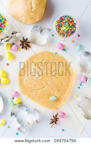 Easter Cooking Background, Dough And Indredients, Cuts For Cookies And Colored Sugar Décor For Bakin