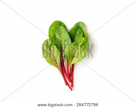 Bunch Of Fresh Green Chard Leaves Or Mangold Salad Leaves On White Background. Flat Lay Or Top View 