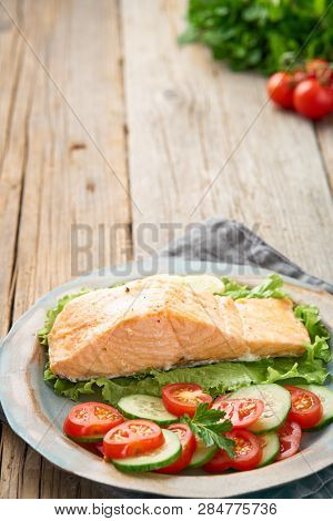 Steam Salmon And Vegetables, Paleo, Keto, Fodmap Diet. Side View, Vertical. Healthy Diet Concept, Bl