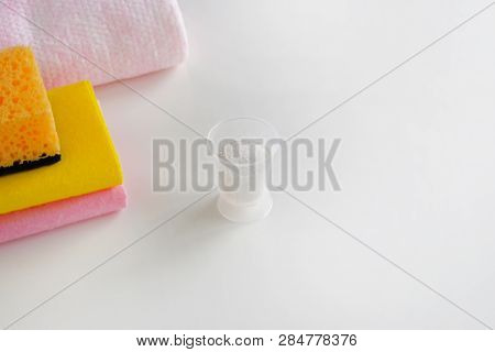 Cleaning Concept. Detergent For Cleaning Room. Measuring Plastic Cup With Granular Cleaning Agent An