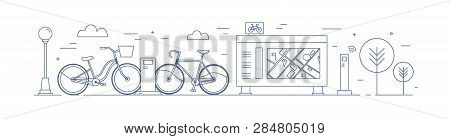 Public Bike Sharing Zone With Bicycles Available For Rent Parked At Docking Stations On Street, Paym