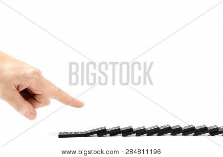Finger, Human Hand Drops The Bones Of Dominoes On A White Background. Fall, Collapse, Coercion, Copy