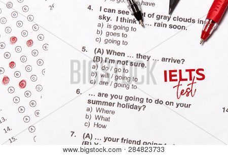 Test Of English Multiple Choice On Table. Top View, Flatlay, Free Space For Text