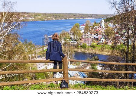 Ples, Russia.girl Admiring The Panorama Of The Old Russian City Of Ples