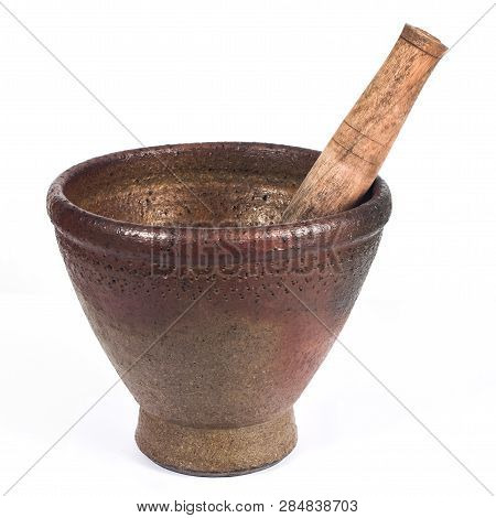 Red Clay Mortar Kitchen Tool On White.