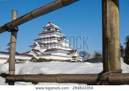 Tsuruga-jo Castle During Winter With Snow Covered When Day Time In Fukushima, Japan.