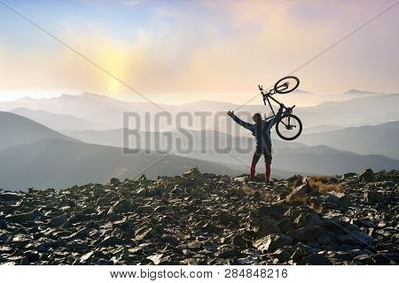 Alpine Landscape With A Biker