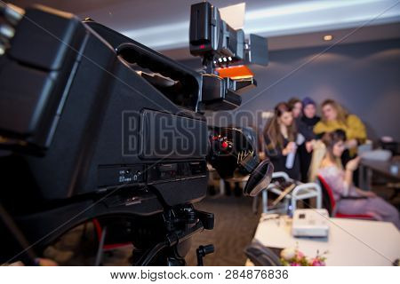 Makeup Cosmetic At Home. Focus On Tripod Mounted Video Camera Screen Showing . In Front Of The Camer