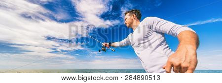 Fishing man casting line fisherman outdoor on blue sky banner background. Sport fishing fish.