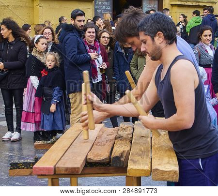 Musician Playing The Txalaparta, A Traditional Instrument Of The Basque Country. Spain.