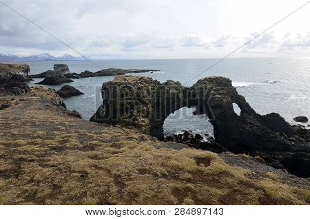 Fantastic Arch Shaped Rock Located Along The Coast Of Arnarstapi Iceland.