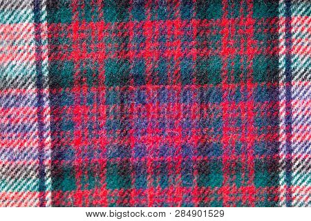 Close Up Of Traditional Scottish Woolen Tartan Fabric