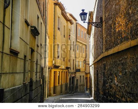 Medieval Narrow Street In Segovia, Spain. Brught Summer Day.