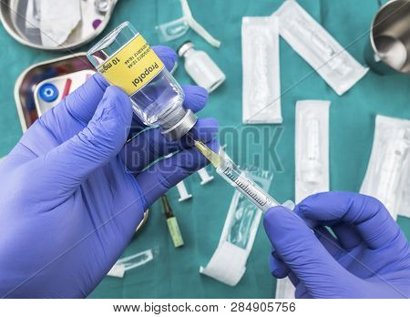 Nurse Preparing Hospital Medication With Propofol, Conceptual Image, Horizontal Composition