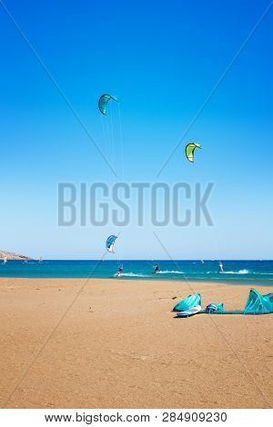 Waves And Kiteboarders On Prasonisi Beach (rhodes, Greece)