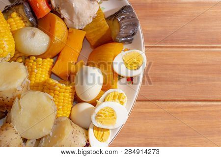 Typical Food Of South America Called Puchero. Herb Meals Accommodated On A Fountain. Fountain With F