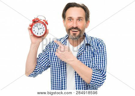 Please Observe Time. Mature Man Pointing Finger At Alarm Clock. Mature Timekeeper With Analog Clock.