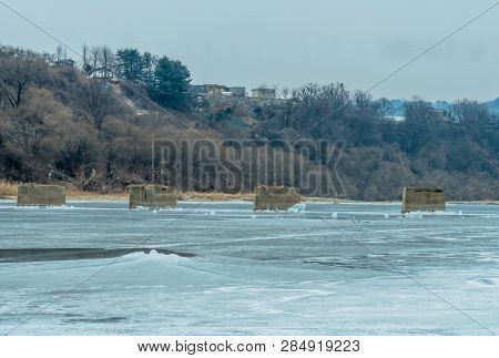 Concrete Columns In Frozen River