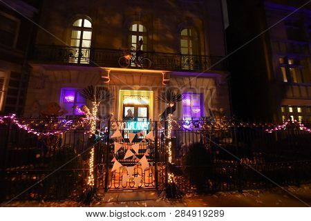 Halloween Decorations Outside The Front Of A House Including Candy Land Themed Decorations, Lights A