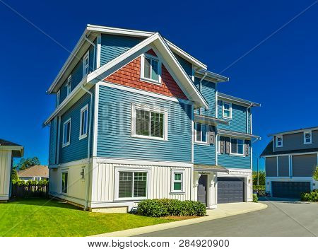 Nice And Comfortable Neighborhood. New Homes, Condos, And Townhouses On A Street In Suburbs Of Vanco