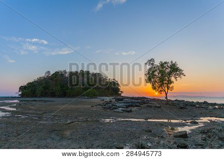Sunset At Kwang Island. Kwang Island Is In The Middle Of Kwang Beach Krabi Thailand.when Low Tide Ca