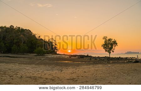 Sunset At Kwang Island. Kwang Island Is In The Middle Of Kwang Beach Krabi Thailand.when Low Tide Ca