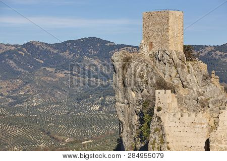 Ancient Castle Tower And Olive Fields In Jaen. Spain