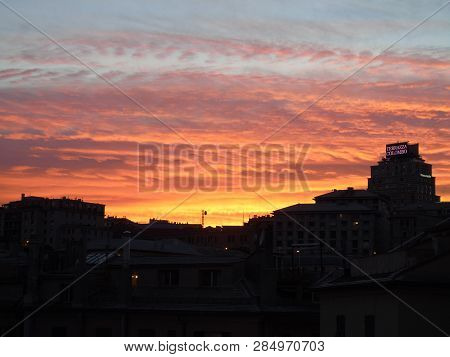 Genova, Italy - 02/12/2019: An Amazing Caption Of The Sunset Over The City Of Genoa In Winter Days C