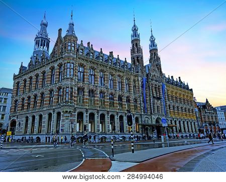 Magna Plaza in Amsterdam Netherlands at sunset