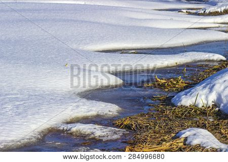 White Snow On A Small River In Russia In Winter