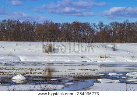 White Snow On A Small River In Russia In Winter