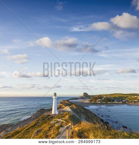 Castlepoint Lighthouse, Wairarapa, New Zealand At Sunrise