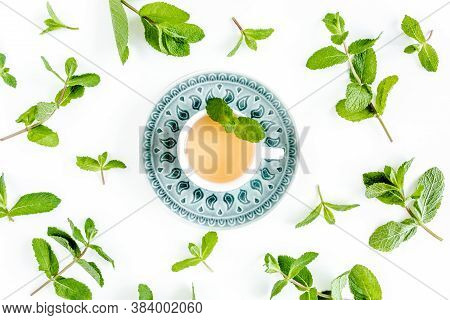 Mint Tea With Frame Made Of Mint Leaves Isolated On White Background. Set Of Peppermint. Mint Patter