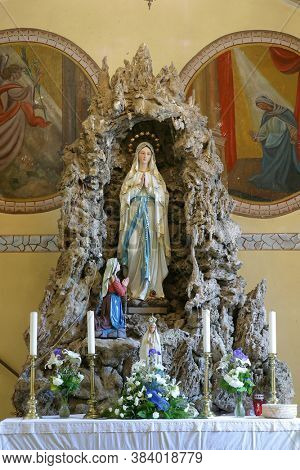 DONJA ZELINA, CROATIA - JUNE 26, 2013: Our Lady of Lourdes at Saint Nicholas Parish Church in Donja Zelina, Croatia
