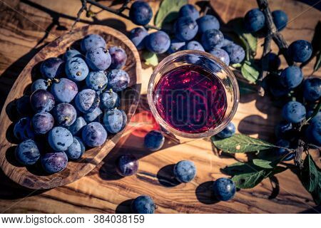 Sloe Liqueur Made Of The Blue Round Fruits Of The Blackthorn Bush
