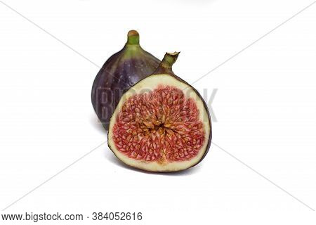 Two Ripe Juicy Figs Isolated On A White Background. Front View. One Fruit In Its Entirety, The Other