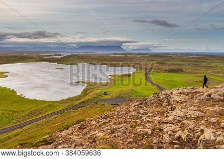 Helgafell, Iceland- 26 August 2015: People In The Holy Mountain And Breathtaking Panoramic View Acro