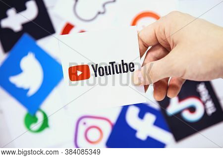 Wroclaw, Poland - August, 29th 2020: Hand Holds Youtube Logo Over Another Social Media Symbols. Yout