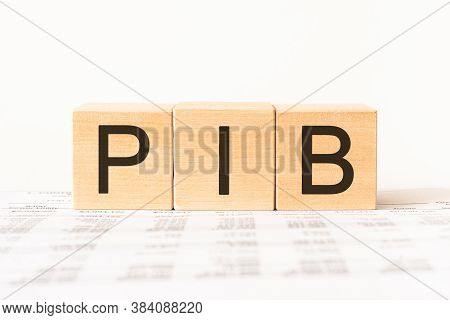 Word Pib. Wooden Small Cubes With Letters Isolated On White Background With Copy Space Available.bus