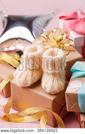 White Warm Handknitted Baby Shoes For Little Girl Or Boy And Gift Box - Concept Of First Step, Birth