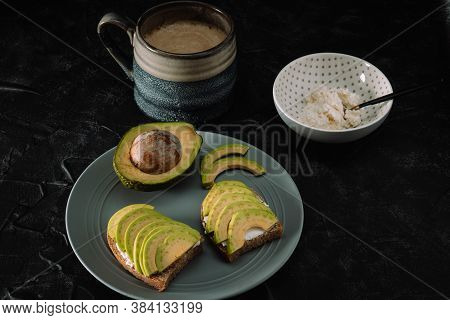 Healthy Vegetarian Breakfast On The Table - Avocado Toast, Coffee