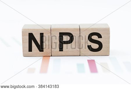 The Text Nps Net Promoter Score On Wooden Cubes. Business Concepts