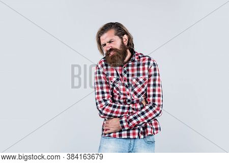 Brutal Man Feeling Hoove. Male Health Care. Pain In Stomach. Mature Hipster With Beard Has Stomachac