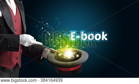 Magician is showing magic trick with E-book inscription, educational concept