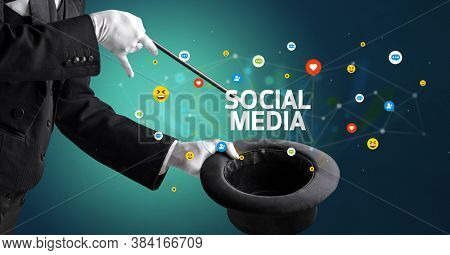 Magician is showing magic trick with SOCIAL MEDIA inscription, social media marketing concept