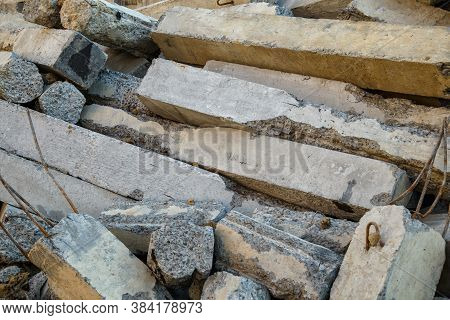 Construction Waste, Concrete Debris From The Demolition, Road. Construction Waste Is Piled Up At Sit