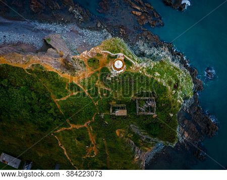 Above. Rudny Lighthouse At Cape Briner In The Village Of Smychka (rudnaya Pristan), Primorsky Territ