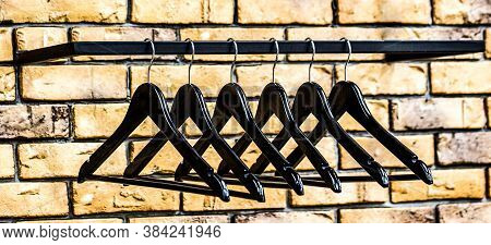 Wood Hangers Coat. Store Concept, Sale, Design, Empty Hangers. Fashionable Different Types Of Hanger